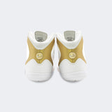 Back heel view of the Nike Freek wrestling shoes in white, available at Combat Corner.