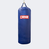Photo of the front of Combat Corner's blue with red label 150 lbs. Made in the USA Punching Bag.
