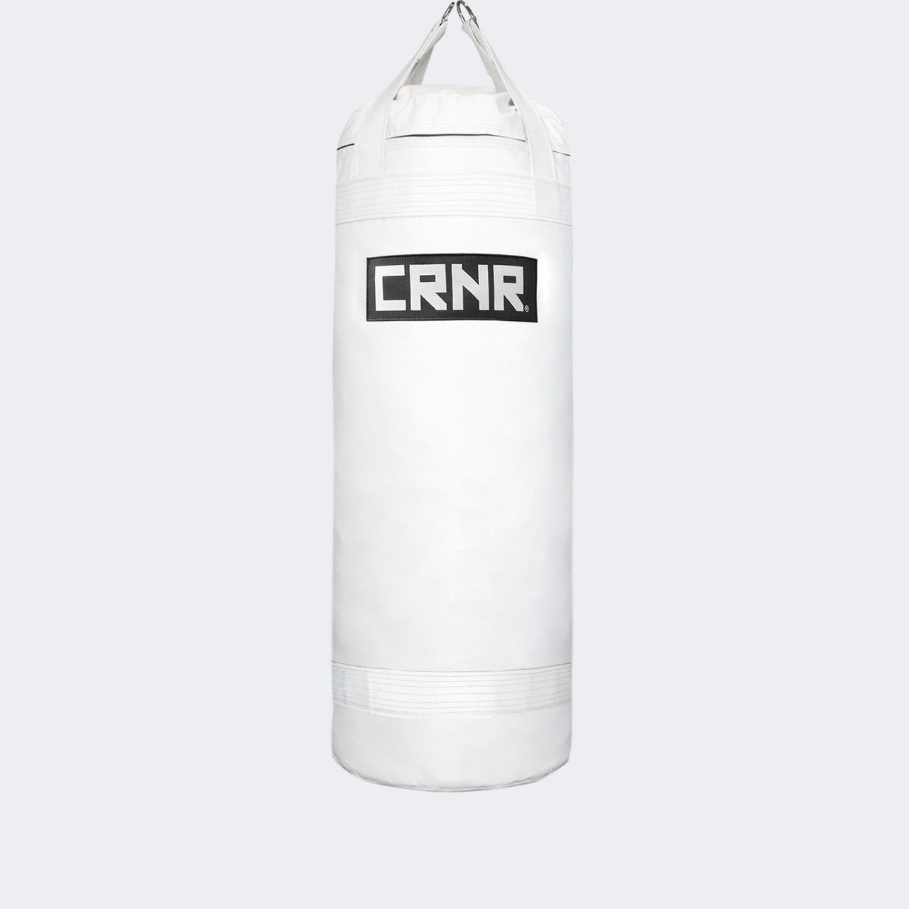 Photo of the front of Combat Corner's white with black label 150 lbs. Made in the USA Punching Bag.