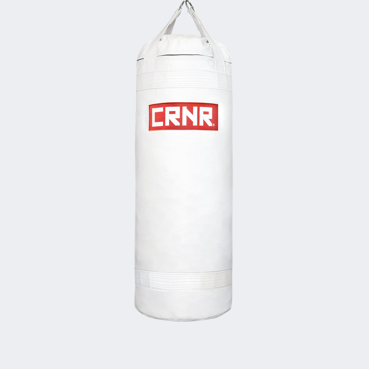 Photo of the front of Combat Corner's white with red label 150 lbs. Made in the USA Punching Bag.