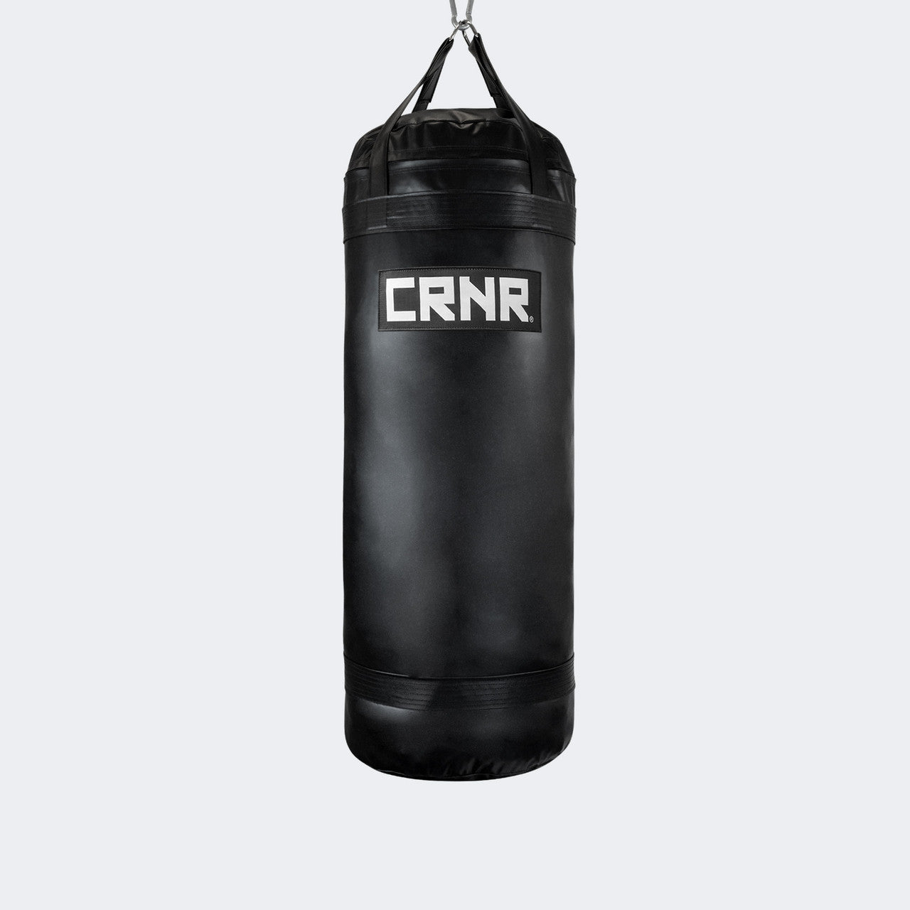 Photo of the front of Combat Corner's black with black label 150 lbs. Made in the USA Punching Bag.