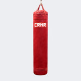 Photo of the front of Combat Corner's red with red label 6 ft., 150 lbs. Made in the USA Punching Bag.