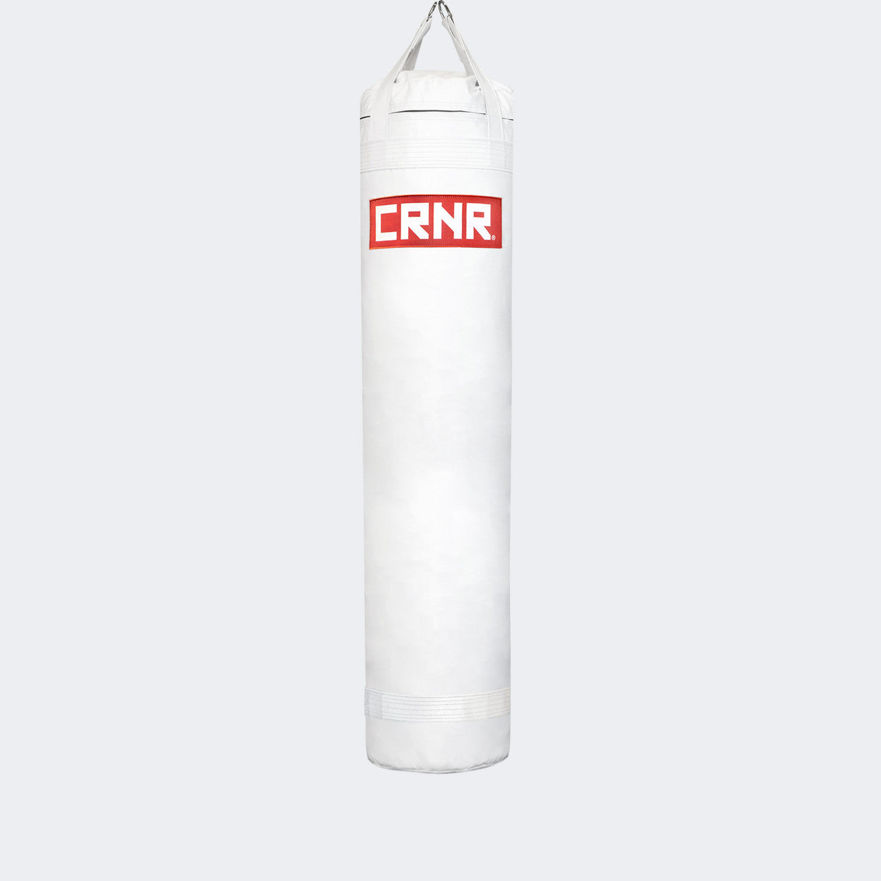 Photo of the front of Combat Corner's white with red label 6 ft., 150 lbs. Made in the USA Punching Bag.