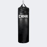Photo of the front of Combat Corner's black with black label 80 lbs. Made in the USA Punching Bag.