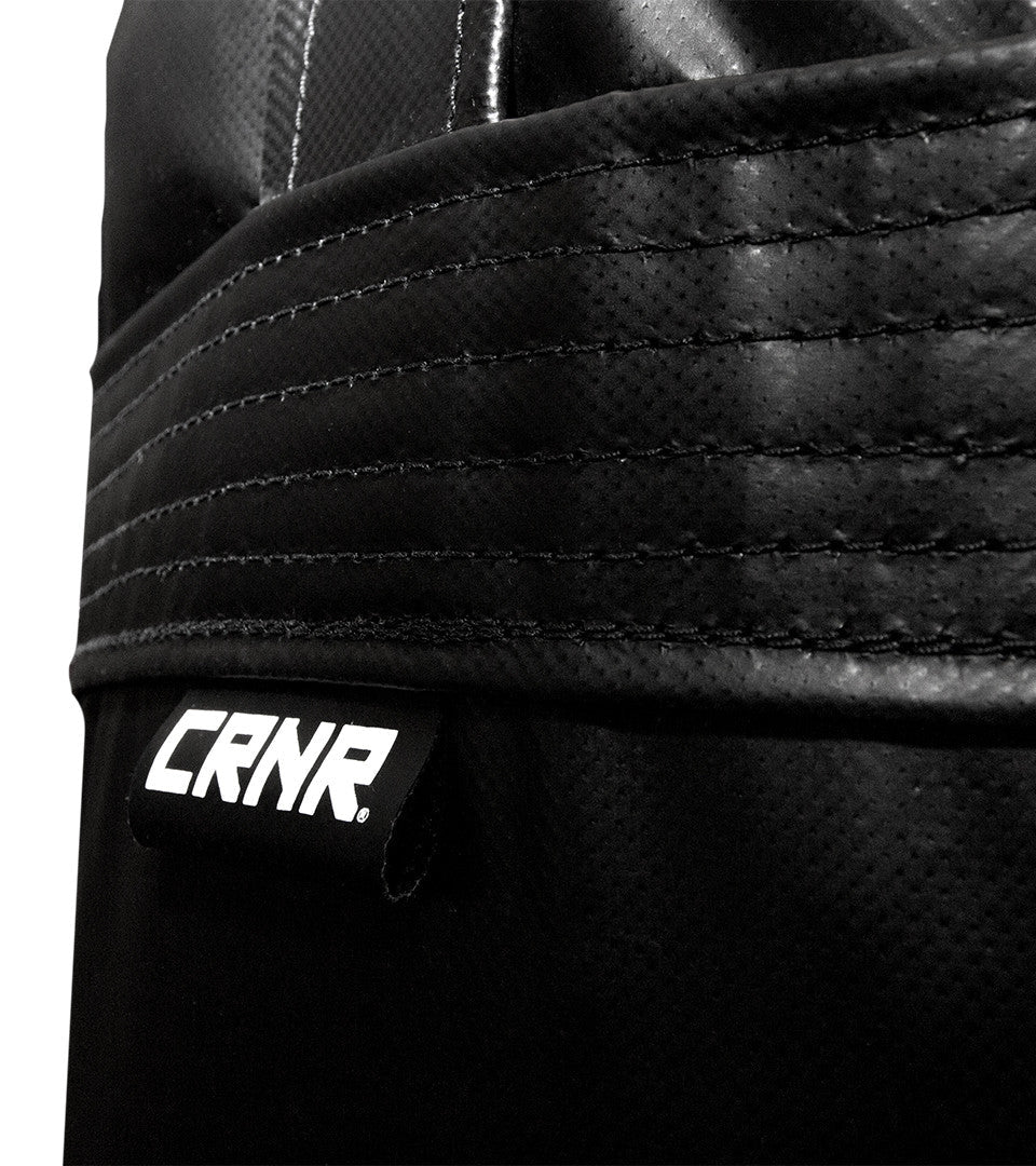 Close up detail photo of Combat Corner's black with black label 100 lbs. Made in the USA Punching Bag.