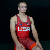 Wrestler Kneeling in Red Singlet