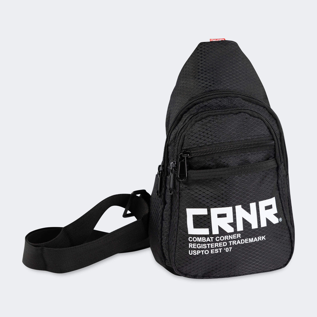 Product photo of the front of the CRNR Sling Bag by Combat Corner