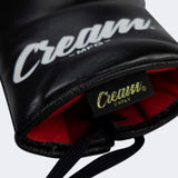 Close up detail photo of the inner scarlet lining of Combat Corner's black Cream TM1 Competition Boxing Gloves, which are Japanese inspired Mexican Boxing Gloves that are hand made in Thailand.