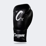 Photo of the front left side of Combat Corner's black Cream TM1 Competition Boxing Gloves, which are Japanese inspired Mexican Boxing Gloves that are hand made in Thailand.