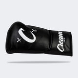 Photo of the horizontal side of Combat Corner's black Cream TM1 Competition Boxing Gloves, which are Japanese inspired Mexican Boxing Gloves that are hand made in Thailand.