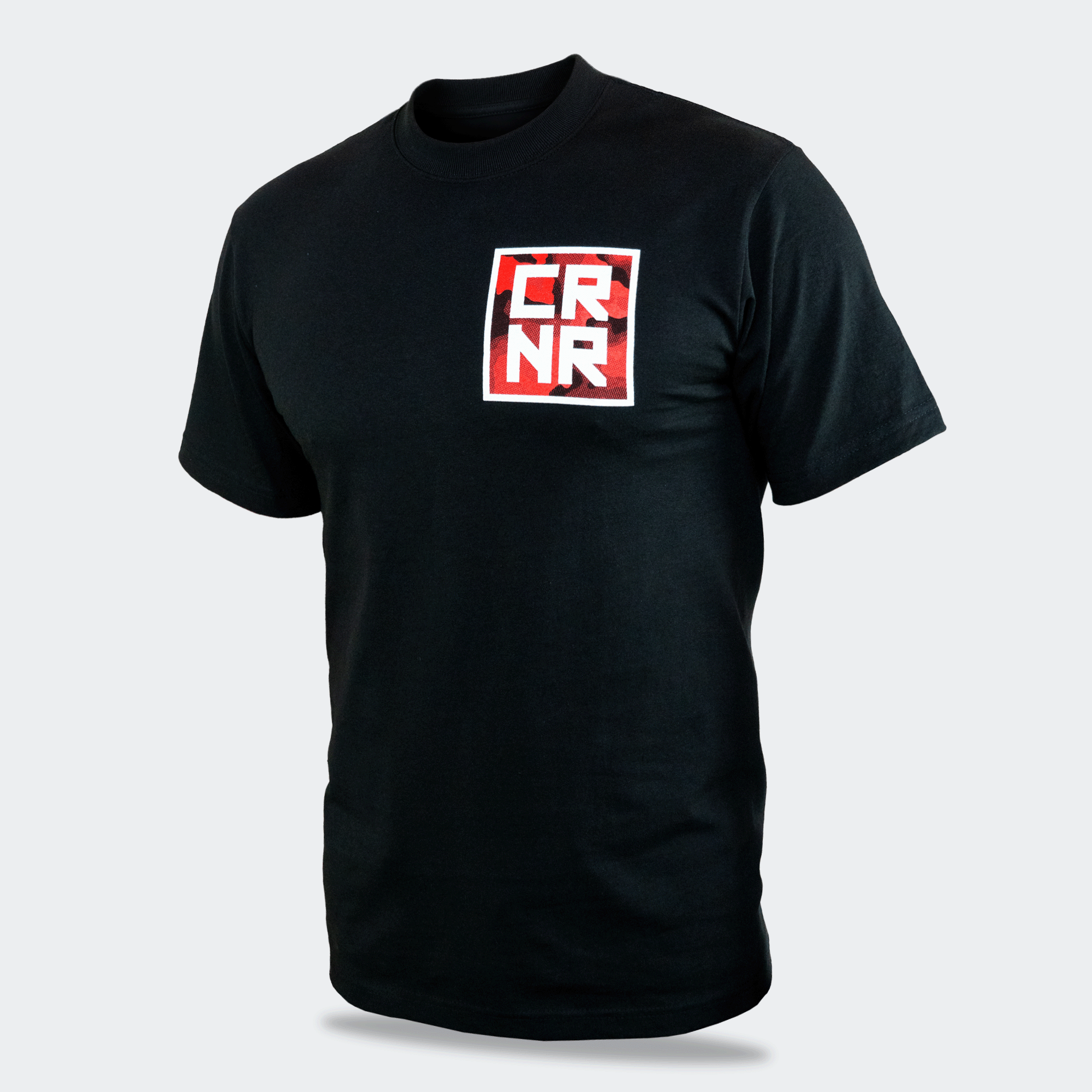 Left front view of the Cinder Topo Stacked T-Shirt by Combat Corner, featuring a red and white square graphic on the left chest with stacked "CRNR" text.