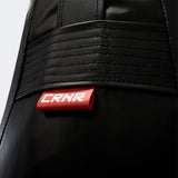 Closeup detail photo of the front of Combat Corner's black Made in the USA Premium Tear Drop Punching Bag.