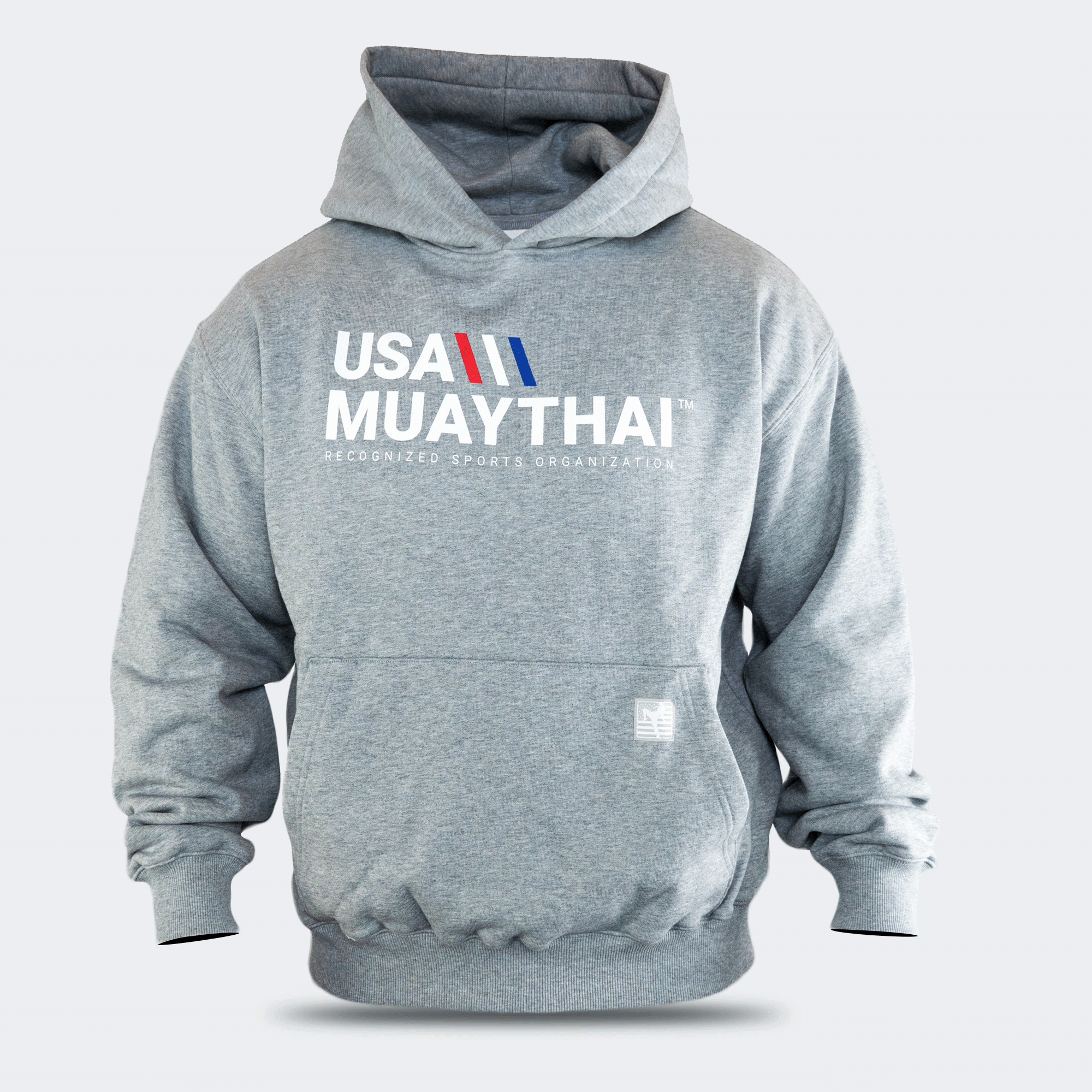 Front view of a heather gray Combat Corner USA Muay Thai lifestyle hooded sweatshirt with a kangaroo pocket, showcasing a white, red, and blue "USA MUAY THAI" graphic across the chest.