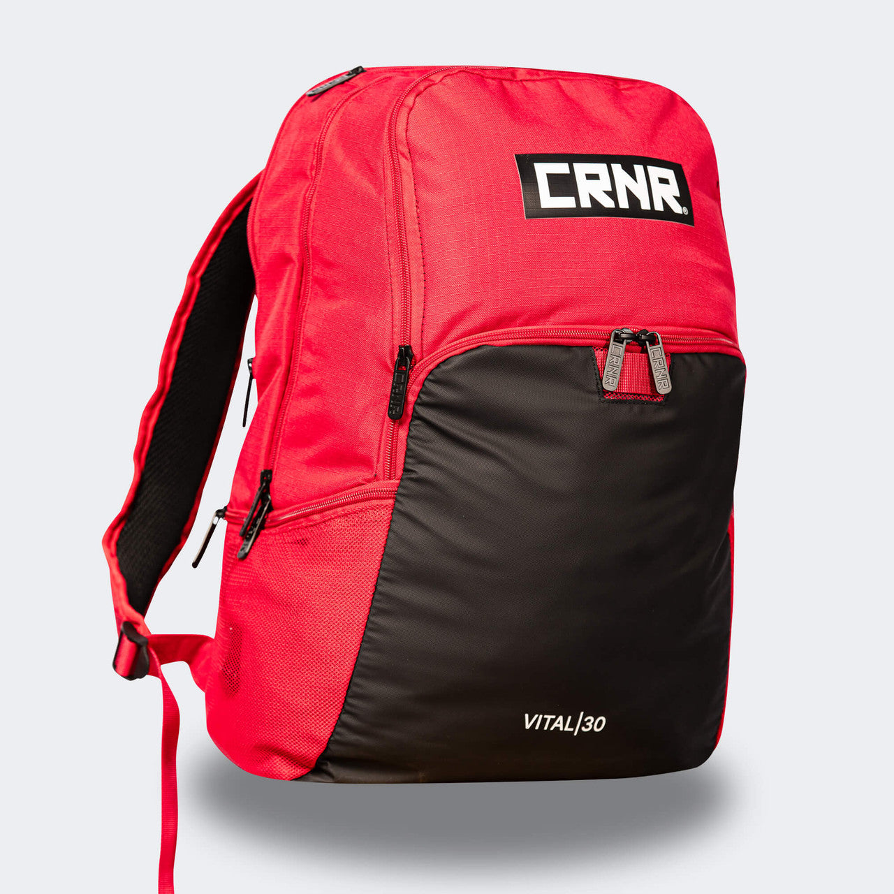 Product photo of the front left angle of the red Combat Corner Vital 30 Training Backpack