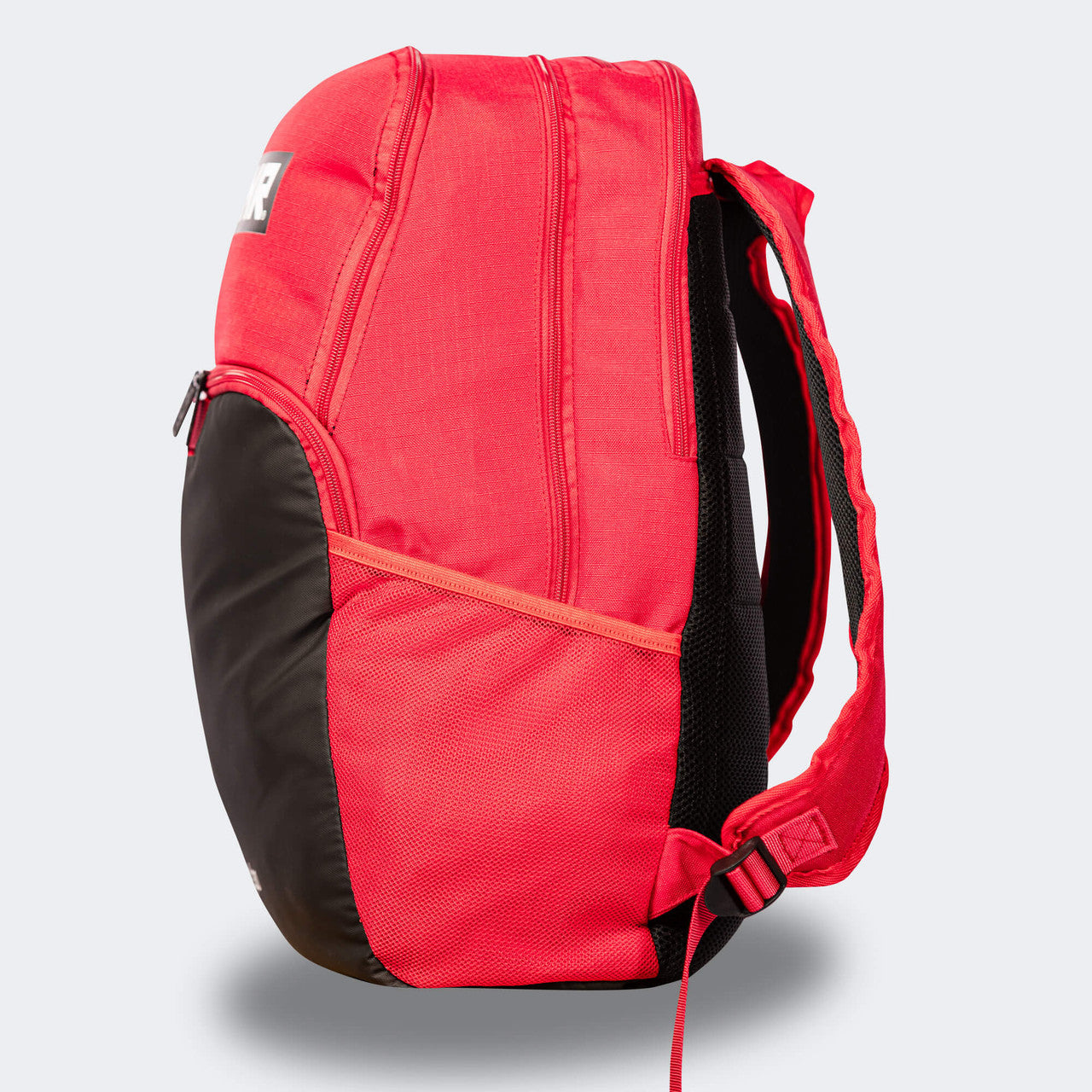Product photo of the right side of the red Combat Corner Vital 30 Training Backpack