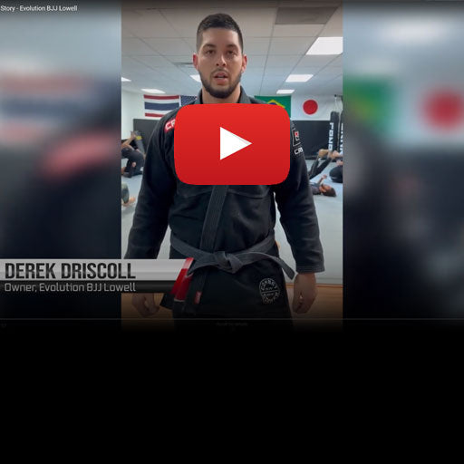 Person in martial arts gear with a YouTube play button overlay, indicating a video clip.